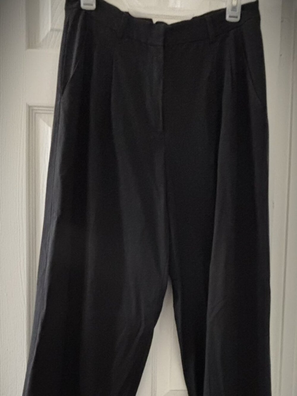 DKNY wide-leg trousers.